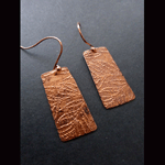 Hand cut copper embossed earrings